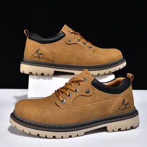 Men's tan brown mid-cut Martin style work boots with Salkin logo and rugged rubber soles