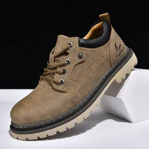 Detailed view of brown men's work boot featuring Salkin brand logo and rugged sole