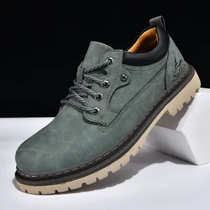 Detail shot of men's green suede work boot with rugged lug sole