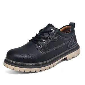 Detailed side view of black leather work boots with Salkin branding and tan sole