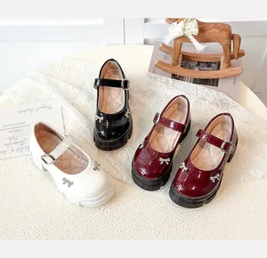 A selection of retro platform Mary Jane shoes in black, white, and burgundy colors.