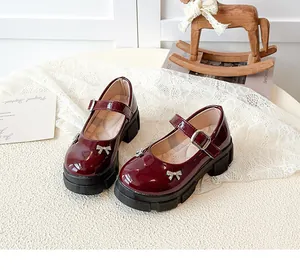 Vintage wine red patent leather Mary Jane shoes with thick platform and bow detail