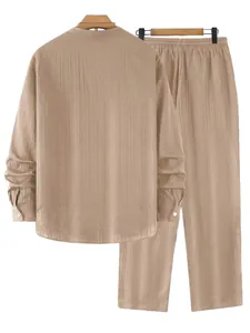 Back view detail of men's brown striped Henley shirt and matching trousers set