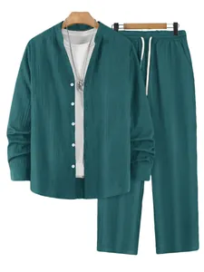Detailed view of men's teal striped long sleeve henley shirt and matching pants set