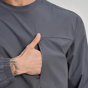 Maglia sportiva ecosostenibile da uomo a maniche lunghe con tasca sul petto con cerniera