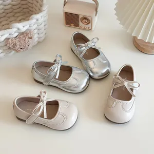 Elegant girls' Mary Jane shoes with bowknot detail in silver and cream colors