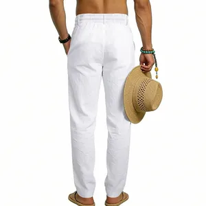 Detail back view of men's white linen loose straight casual trousers with elastic waist