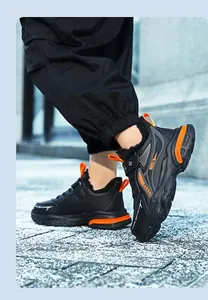 Close-up view of boys waterproof leather running shoes with warm black plush lining