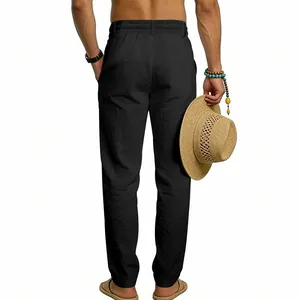 Men's loose straight-leg linen casual pants in black, stylish vacation style back view