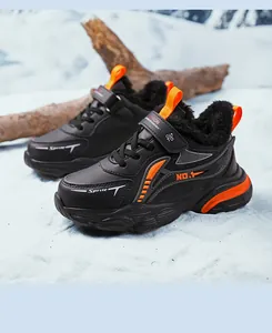Black and orange winter boots for boys with warm plush lining and waterproof upper