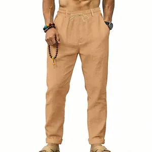 Detail view of men's linen casual pants with drawstring waist and straight leg