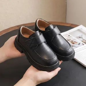 Classic black leather shoes for boys, perfect for school and formal events.