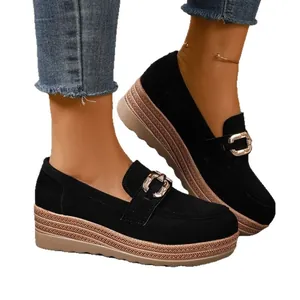 Stylish women's black suede platform loafers featuring metal buckle and woven wedge sole