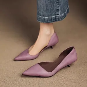 Elegant purple pointed-toe d'Orsay kitten heel pumps perfect for professional wear