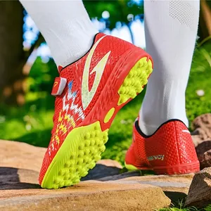 Scarpe da calcio rosse per bambini con suole TF gialle e cinturini in velcro sicuri