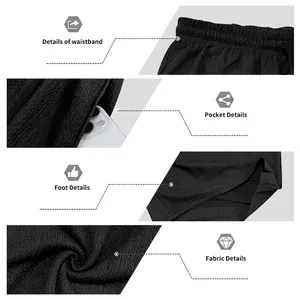Vista detallada del pantalón corto deportivo de doble capa para hombre: cintura y tejido
