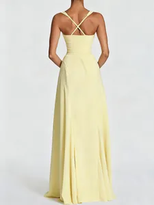 Robe longue jaune élégante dos nu de style français avec bretelles croisées pour femmes