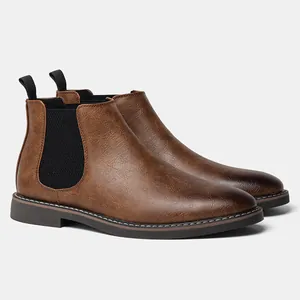 Detailed side view of classic brown burnished men's Chelsea boots with elastic sides.