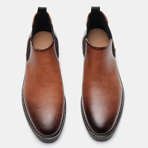 Top view of men's British style Chelsea boots with burnished brown leather finish