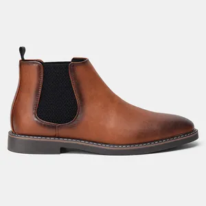 Detailed side view showing the burnished leather texture of men's British Chelsea boots