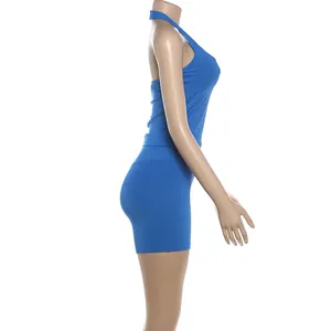 Side view of blue halter neck sports tank top and matching tight shorts