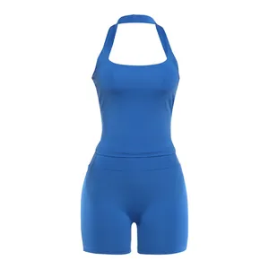 Front display of a vibrant blue halter neck sports tank top and high waist matching shorts.