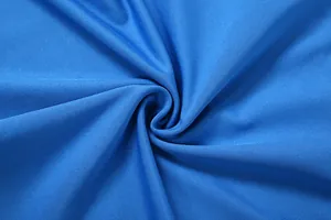 Macro view of bright blue high-elasticity fabric texture for sporty women's apparel