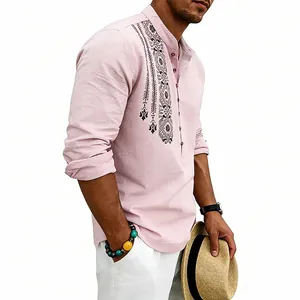 Detail of men's pink linen shirt featuring ethnic print and stand collar buttons