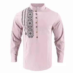 Detailed view of pink men's linen shirt featuring black ethnic print and stand collar