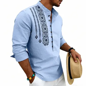 Men's light blue ethnic linen shirt with intricate embroidery and stand collar detail.