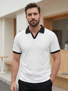 Close-up of men's white polo shirt featuring a textured cable knit pattern and black collar