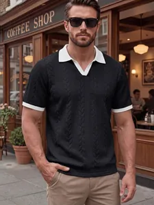 Detailed view of men's black jacquard polo shirt with contrast white collar