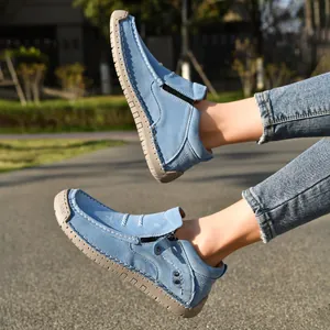 Light blue handmade leather outdoor casual shoes shown on foot in natural light