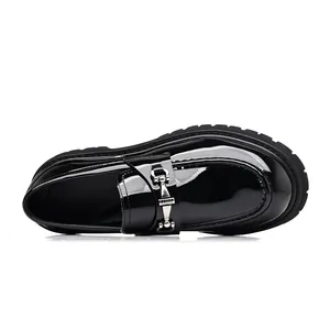 Top view of men's chunky patent leather loafers with silver horsebit buckle detail