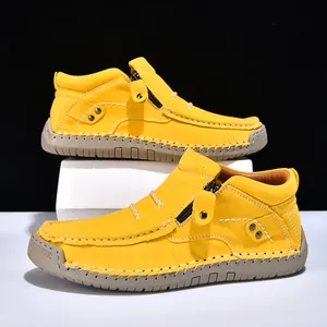 Yellow high-top casual shoes for women featuring side zippers and white stitching details
