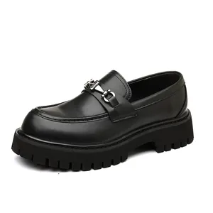 Professional studio shot of black mens chunky platform loafers with silver bit detail
