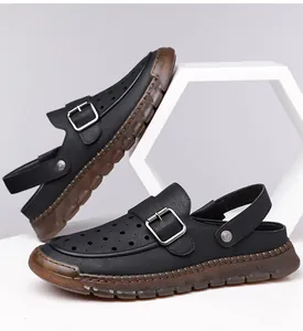 Detailed view of men's black breathable hollow sandals featuring a stylish buckle strap