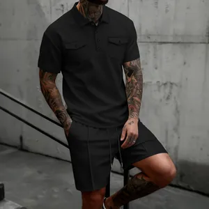 Schwarzes Waffel-Polo-Shirt und Shorts-Set für Herren mit zwei Brusttaschen für den Sommer