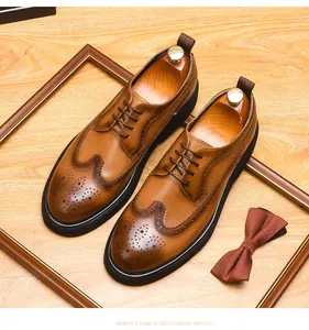 Gedetailleerd overzicht van heren bruine leren Brogue-schoenen met elegante versieringen