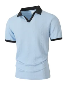 Detail view of men's light blue polo shirt with black contrast collar and jacquard texture