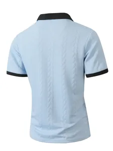 Back view of a light blue jacquard polo shirt with black contrast collar and cuffs