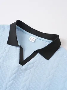 Close-up detail of a light blue jacquard Polo shirt featuring a contrasting black collar.