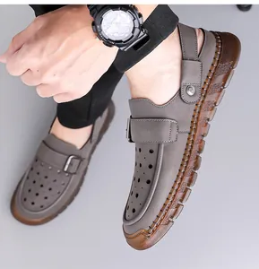 Close-up of men's grey breathable hollowed-out loafers with non-slip translucent soles