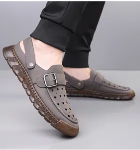 Detail view of men's breathable hollowed-out clogs with adjustable buckle strap