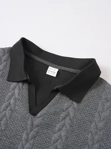 Detailed view of a men's business casual polo shirt collar with grey jacquard fabric texture