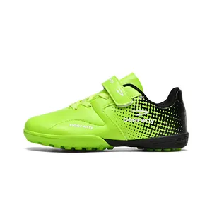 Vibrant neon green kids' turf soccer shoes with Velcro strap and Deerway brand logo