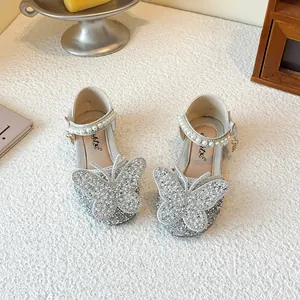 Silver sparkly girls princess shoes with butterfly crystal detail and pearl strap