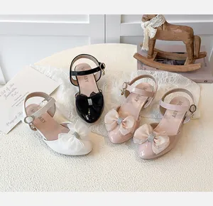 Elegant children's pointed toe sandals with sparkly rhinestone bows in various colors
