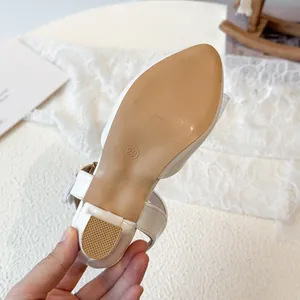 White girls' pointed-toe high-heel sandal sole showing size 29 and non-slip heel