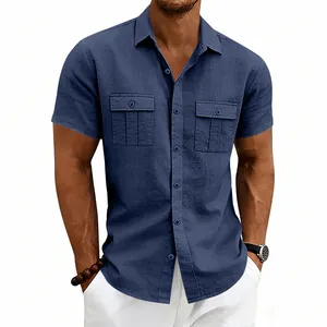 Close-up of men's navy blue linen cargo shirt with two buttoned chest pockets